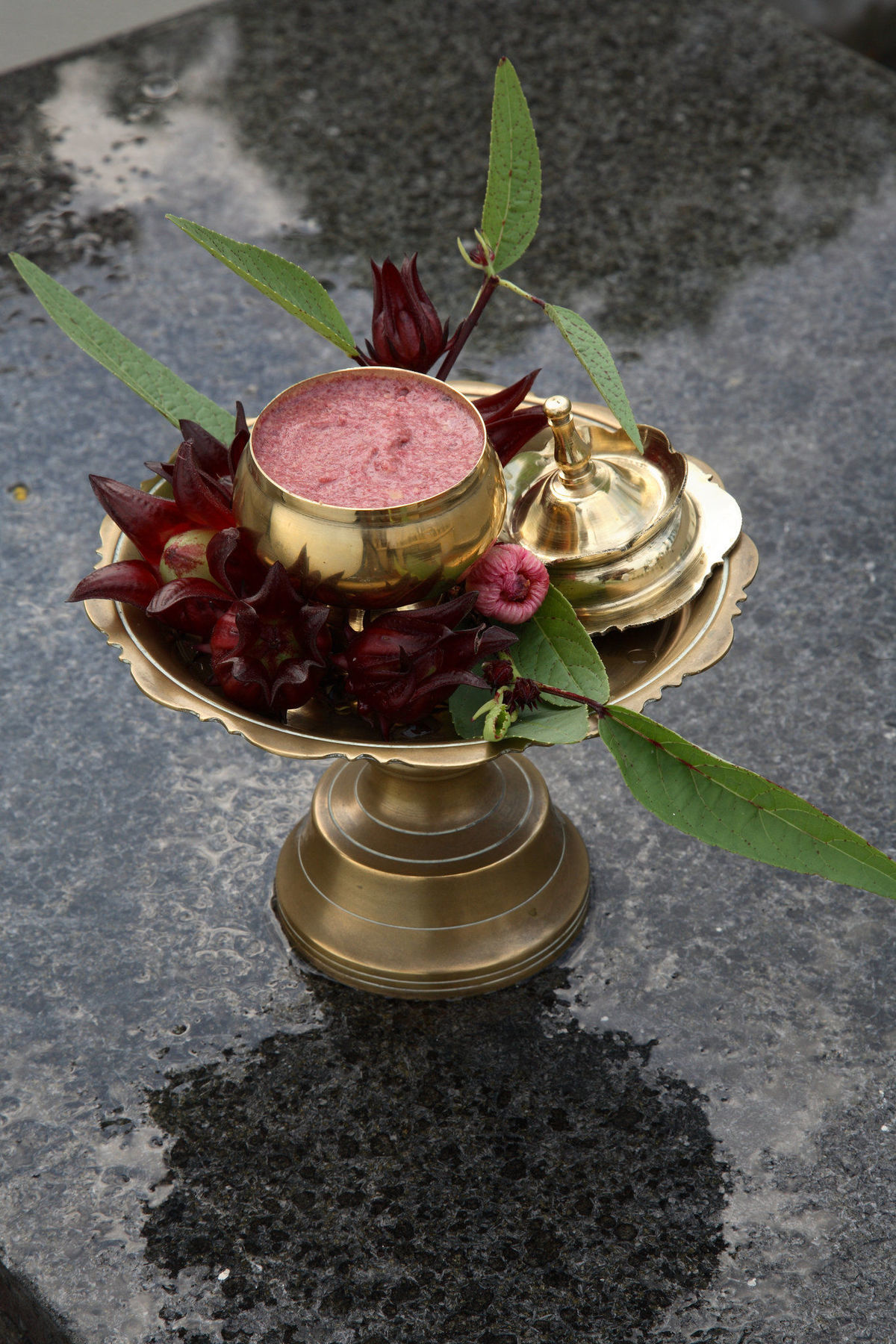 Tanjong Jara Resort, Terengganu - A Small Luxury Hotels Of The World Dungun Esterno foto A brass thali with a bell, flowers and a pot of halwa